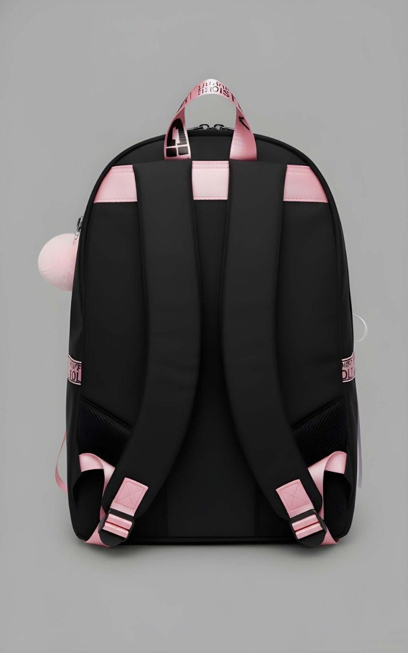 Black backpack with pink straps on a gray background