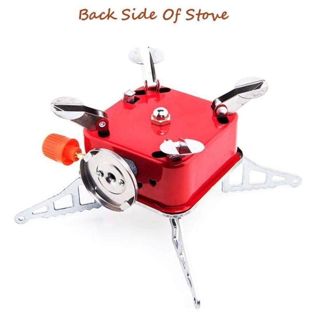 Red camping stove with metal components on a white background