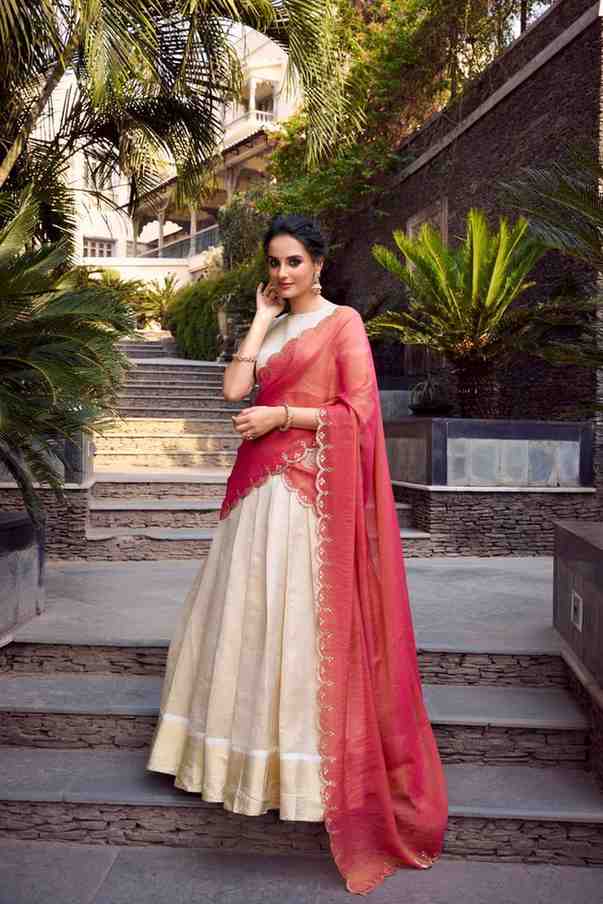 Bridal style golden lehenga close up embroidery