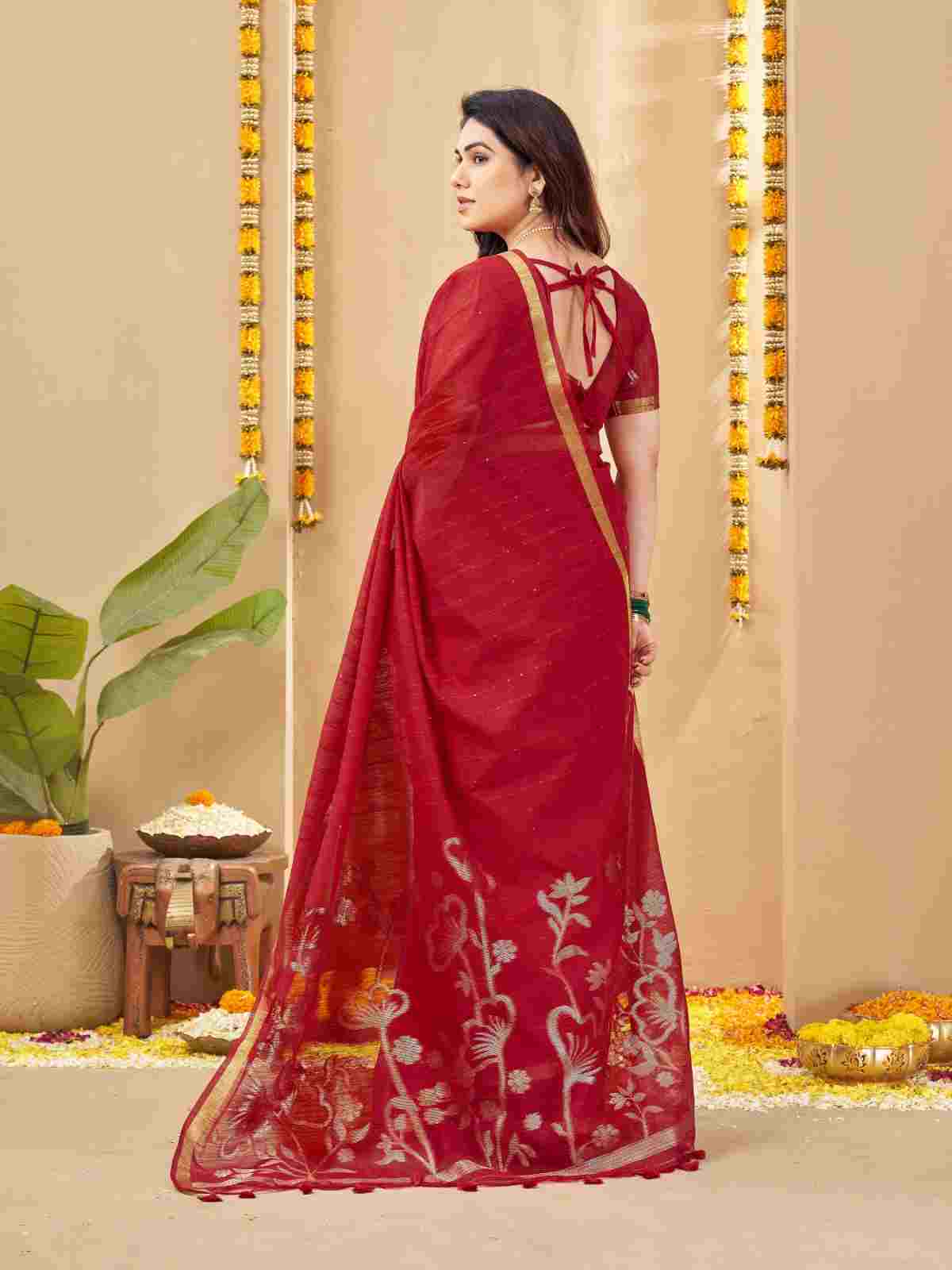 Back view of red saree showing tie-up back blouse.