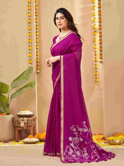 Magenta linen silk saree showing silver zari floral motifs.