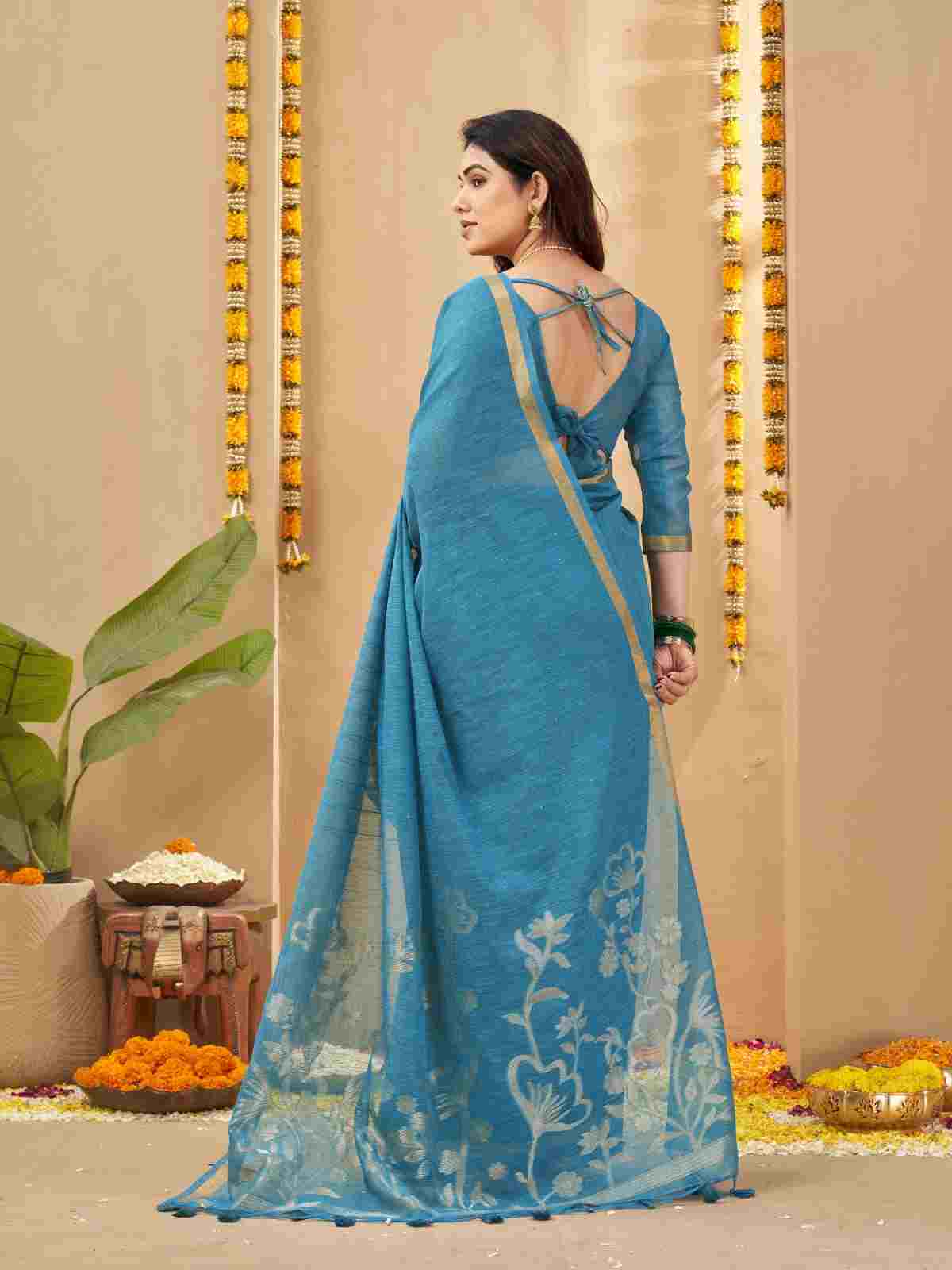 Back view of draped linen silk saree with tie-up blouse.