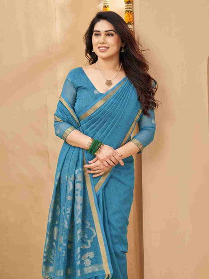 Model wearing neatly draped zari linen silk saree.
