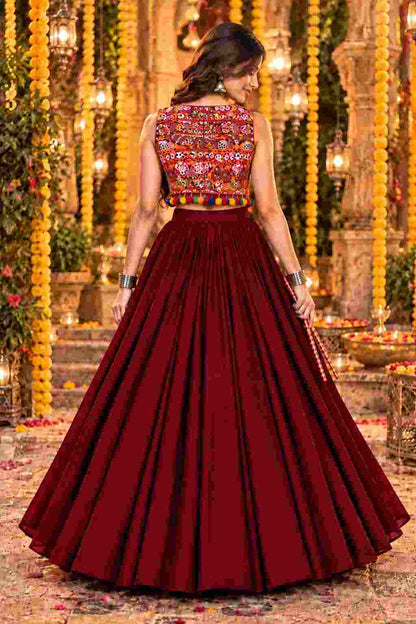 Back view of a maroon lehenga set featuring a Katchi mirror jacket.