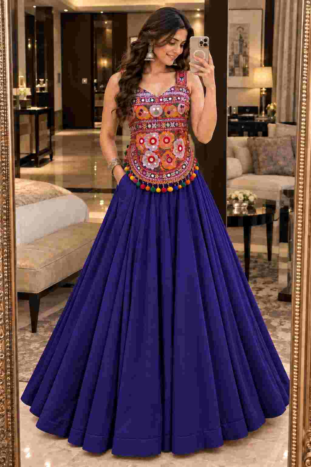 A Navy Blue lehanga with side pockets and mirror design top.