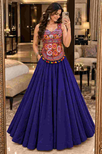 A Navy Blue lehanga with side pockets and mirror design top.