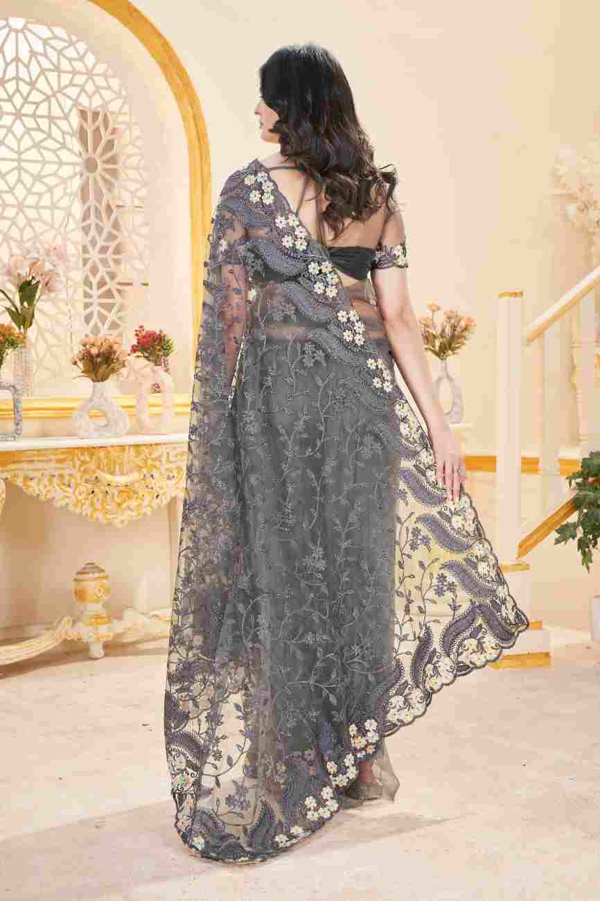 Elegant net saree embellished with decorative stone work