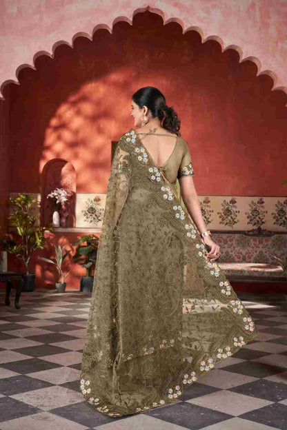 Women's festive net saree embellished with stone work