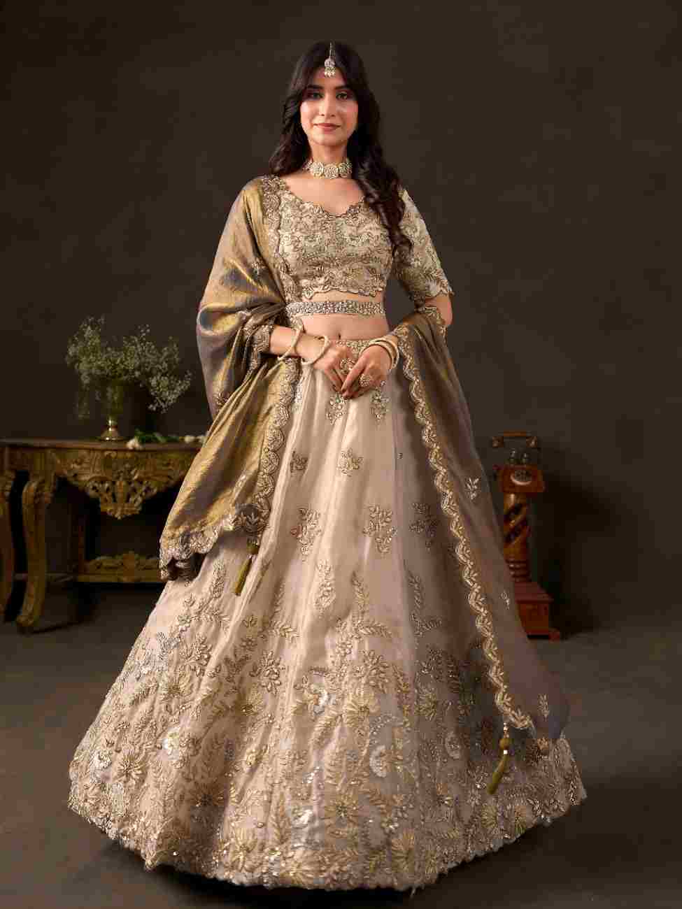 Elegant Fendy outfit with traditional zari embellishments