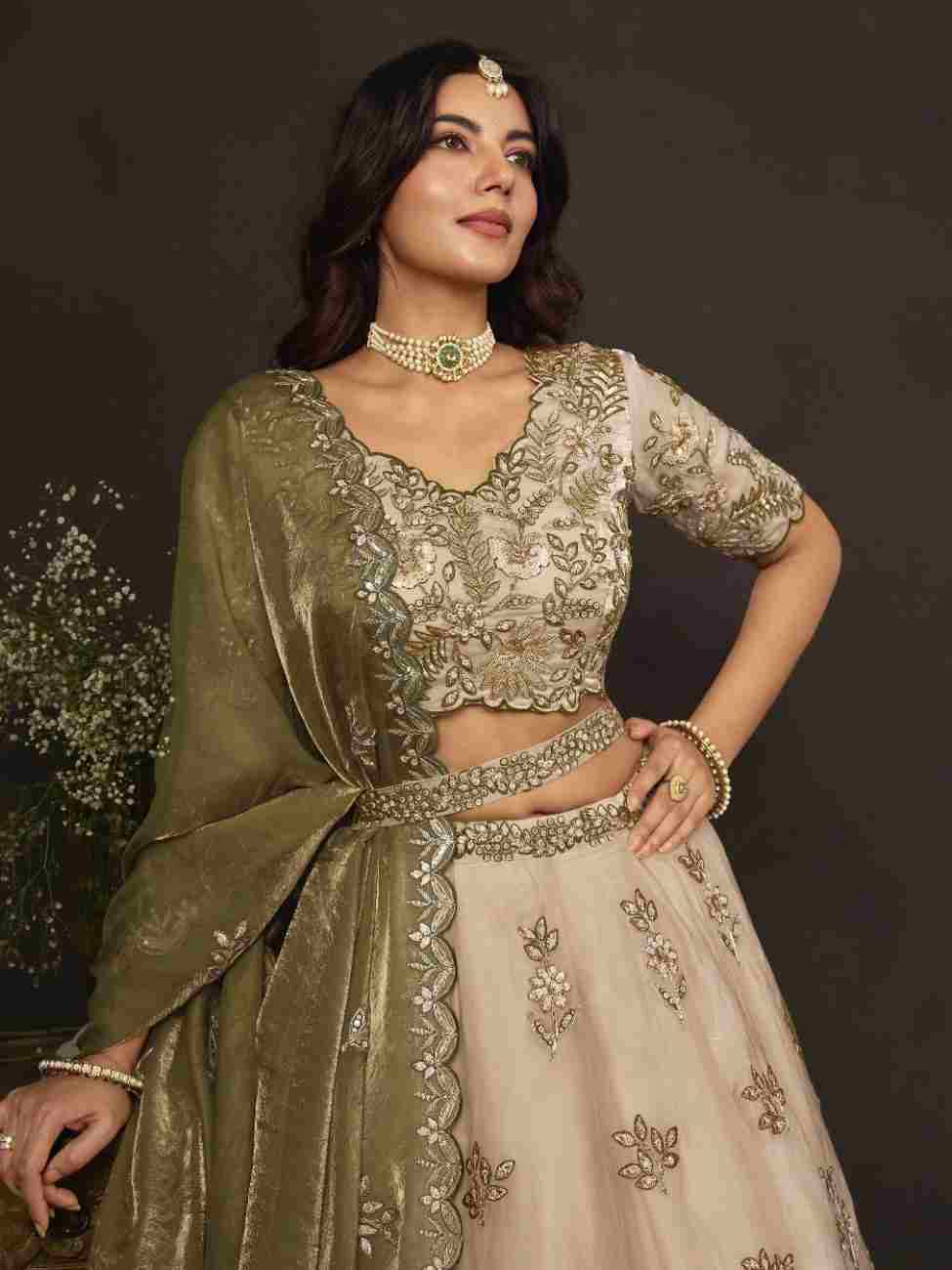 Elegant designer outfit featuring Dori and sequin work