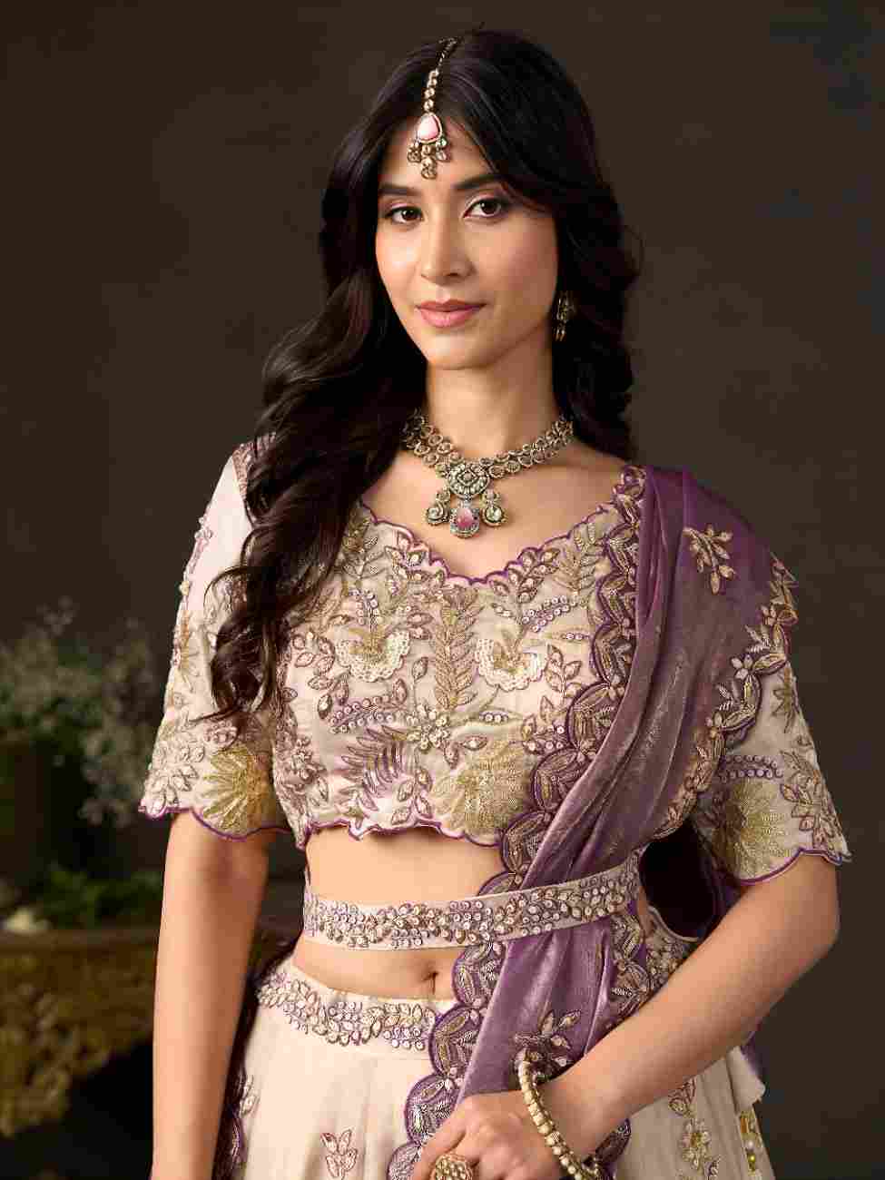 Traditional designer fashion featuring Dori and zari work