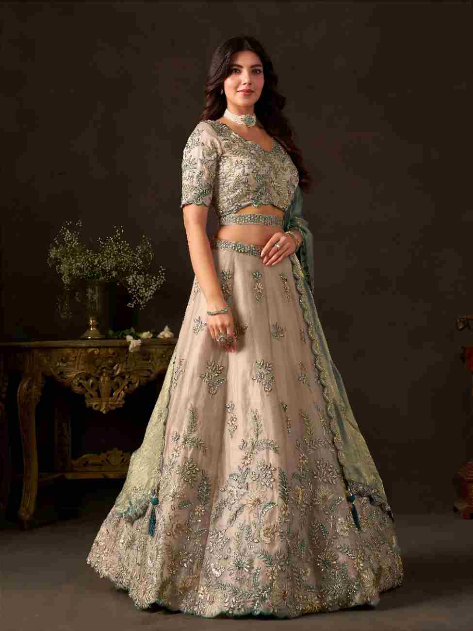 Stylish embroidered outfit with traditional zari details