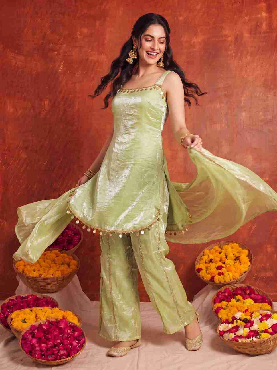 Women's ethnic suit with decorative lace detailing.