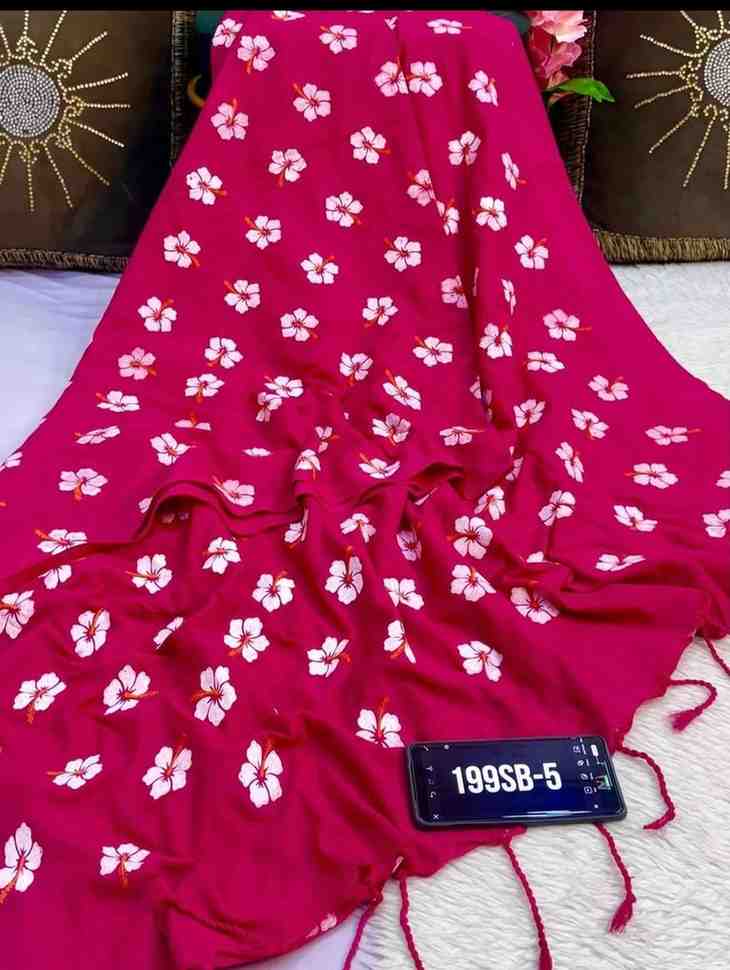Red fabric with white floral patterns on a textured surface