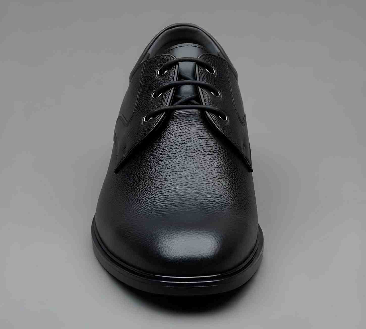 Men lace up office footwear close up