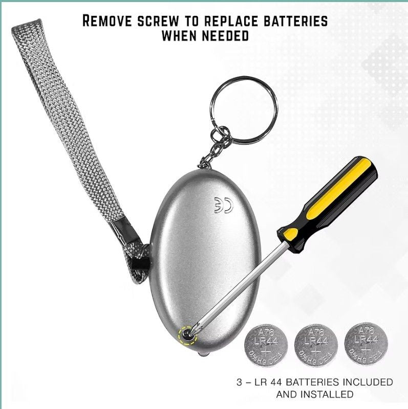 Compact women safety alarm device on keychain ring