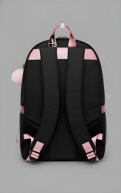 Black backpack with pink straps on a gray background