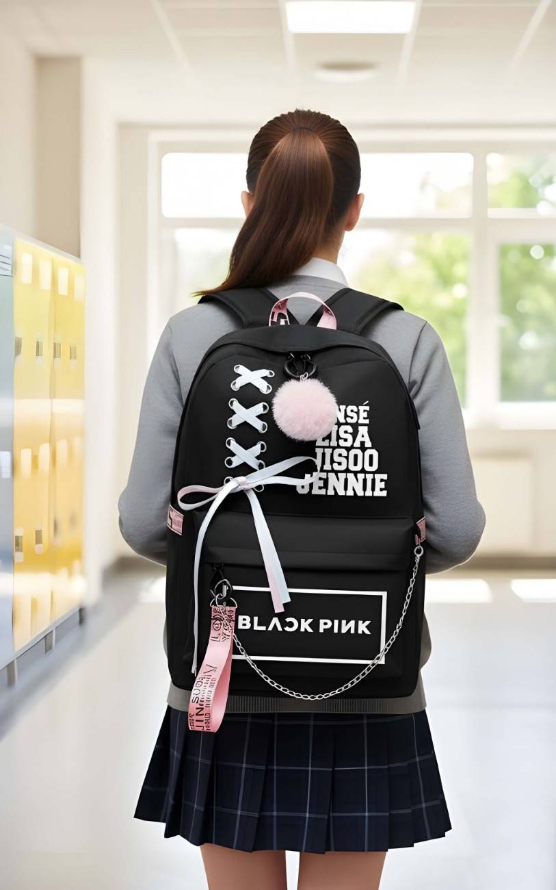 Person wearing a black backpack with 'Black Pink' branding in a school hallway.