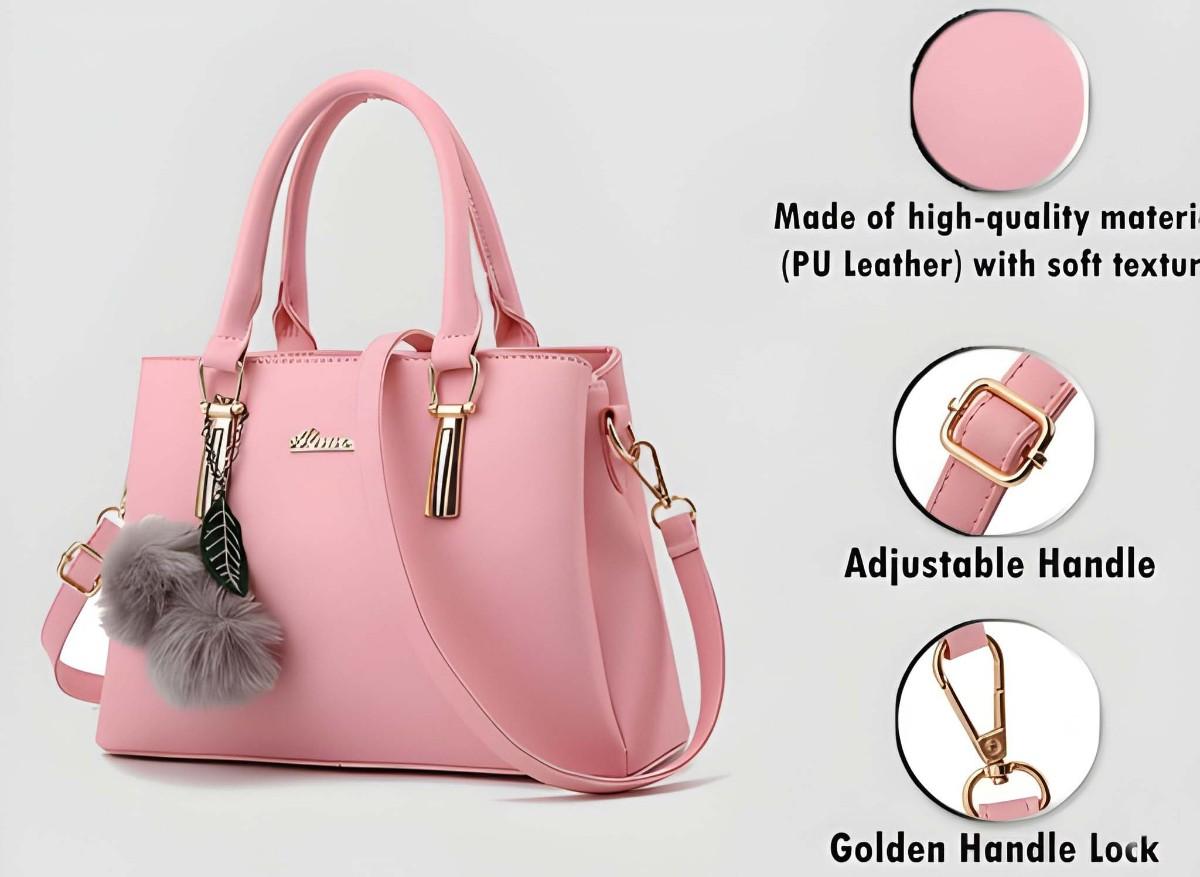 Pink handbag with decorative elements on a light gray background