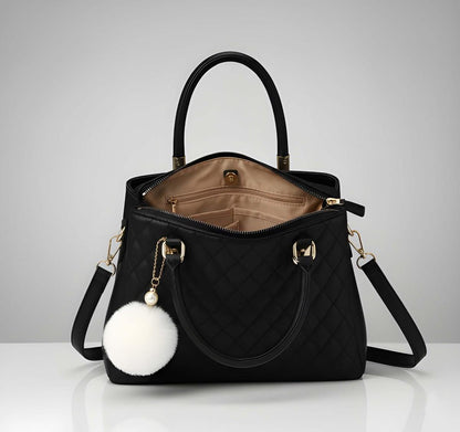 Black handbag with a white 