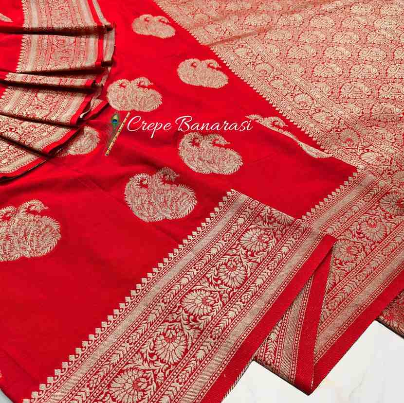 Red Crepe Banarasi saree with white floral patterns on a white background