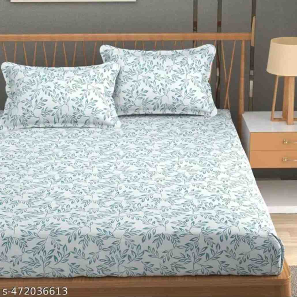 Elastic fitted king size bedsheet with pillow covers in printed glace cotton fabric.