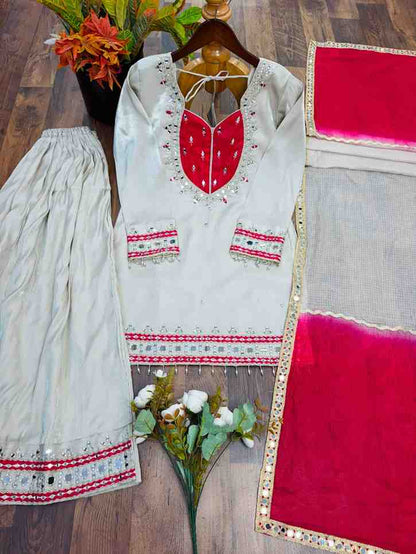 “White mirror work kurti set with palazzo and dupatta for women festive wear”