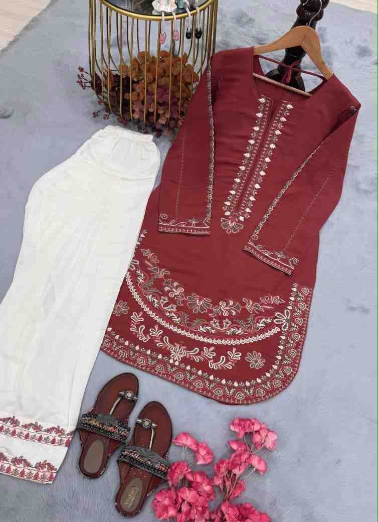 “Elegant maroon kurti with detailed embroidery paired with white palazzo for women”