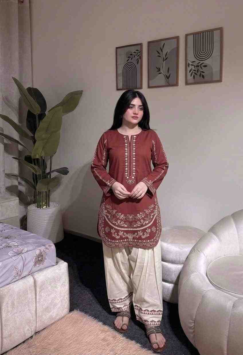 “Traditional maroon kurti with embroidered detailing and rayon palazzo”