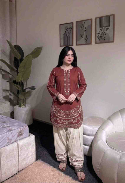 “Traditional maroon kurti with embroidered detailing and rayon palazzo”