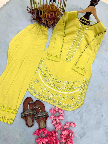 “Women’s yellow embroidered kurti with matching palazzo set ethnic wear”