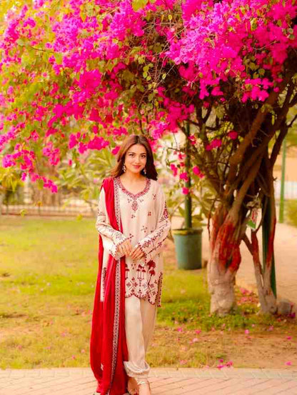 Beige embroidered harem salwar suit set with red dupatta for women