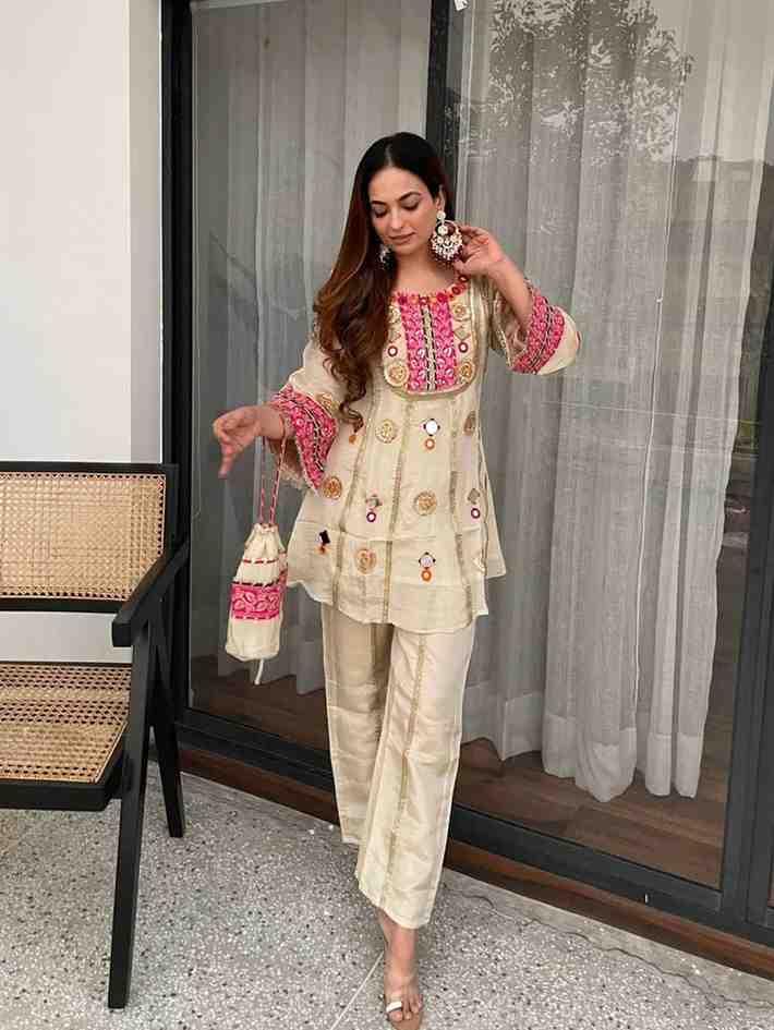 Stylish cream top and palazzo set for wedding wear