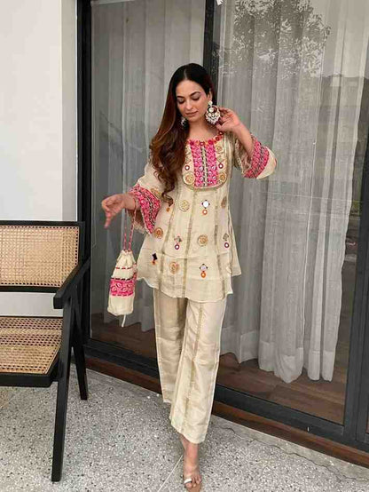 Stylish cream top and palazzo set for wedding wear
