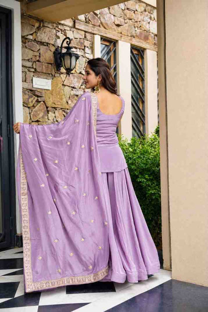 Festive lavender suit set with sharara and dupatta