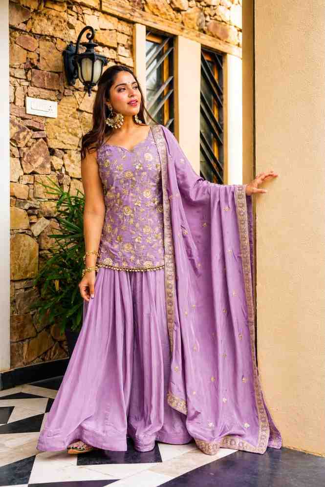 Traditional lavender outfit with embroidered top and sharara