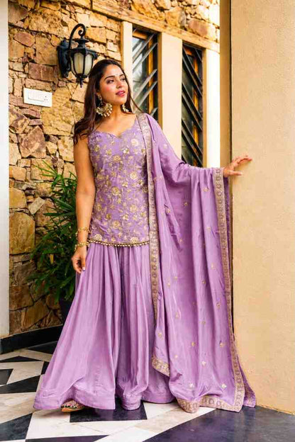 Traditional lavender outfit with embroidered top and sharara