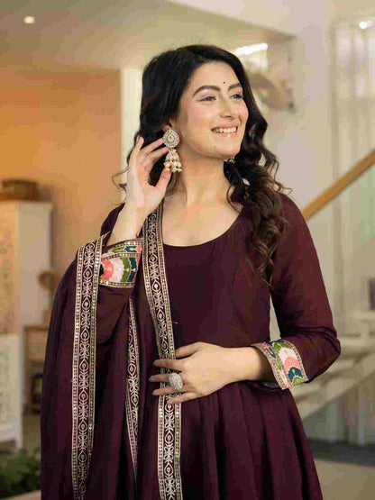 Festive Anarkali suit for women featuring heavy Roman silk and intricate embroidery work