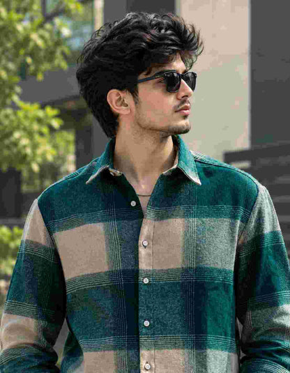 Close-up shot wearing boxy fit checked jute cotton shirt.   