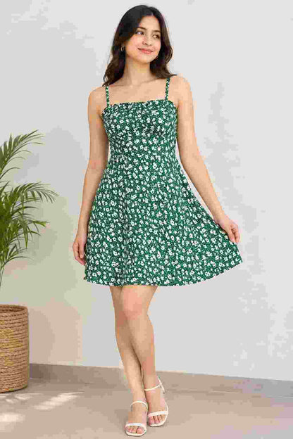 Standing view wearing a floral printed A-line dress.   