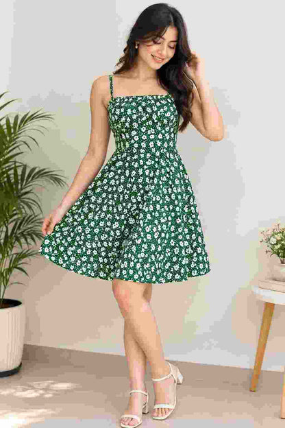 Sleeveless A-line floral dress with noodle straps.