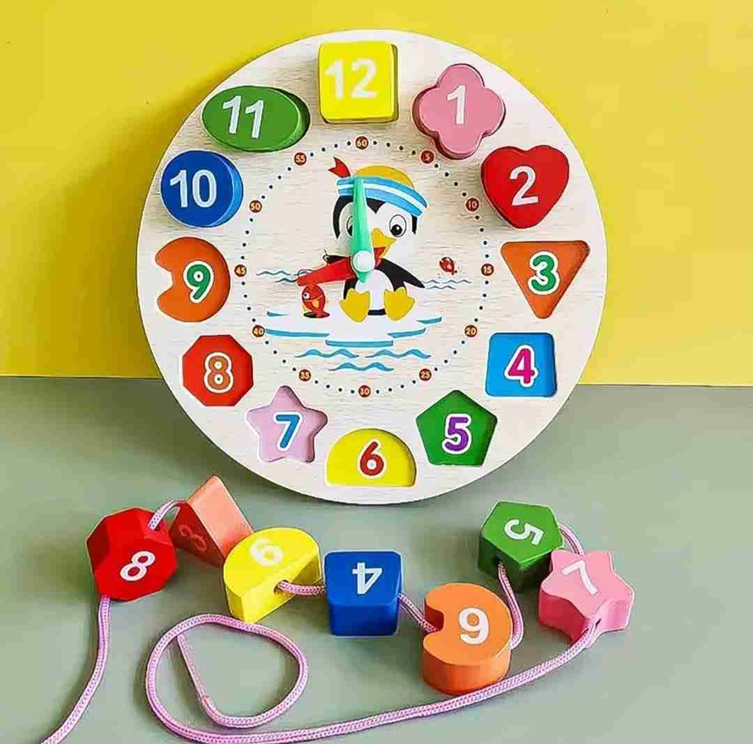Kids learning clock for shapes and colour recognition