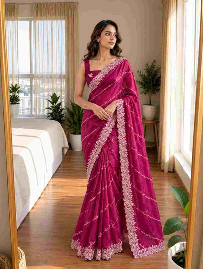 Designer women’s Rangoli silk saree with intricate thread embroidery