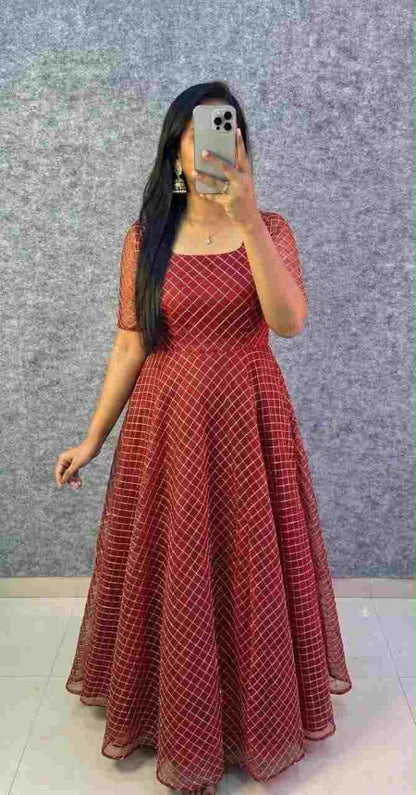 Women’s heavy net frock with cording work and crepe lining