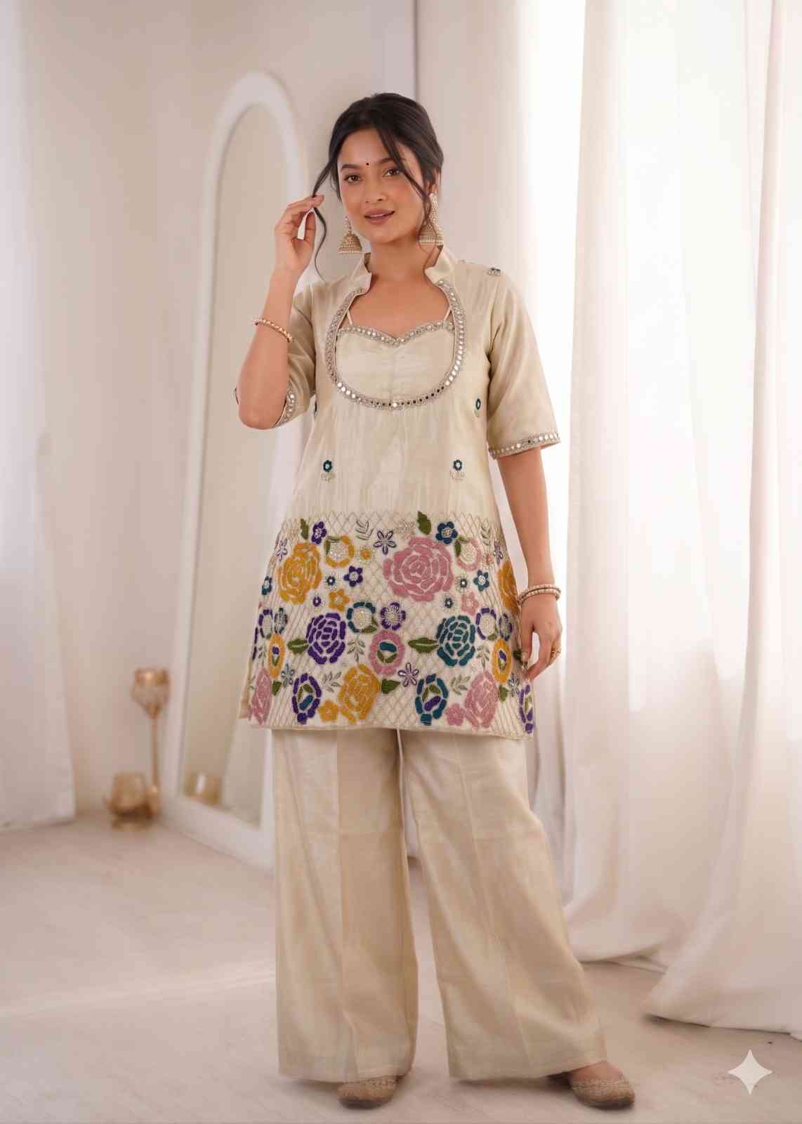 Fashionable women’s ivory co-ord evening wear