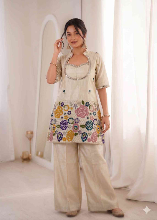 Fashionable women’s ivory co-ord evening wear