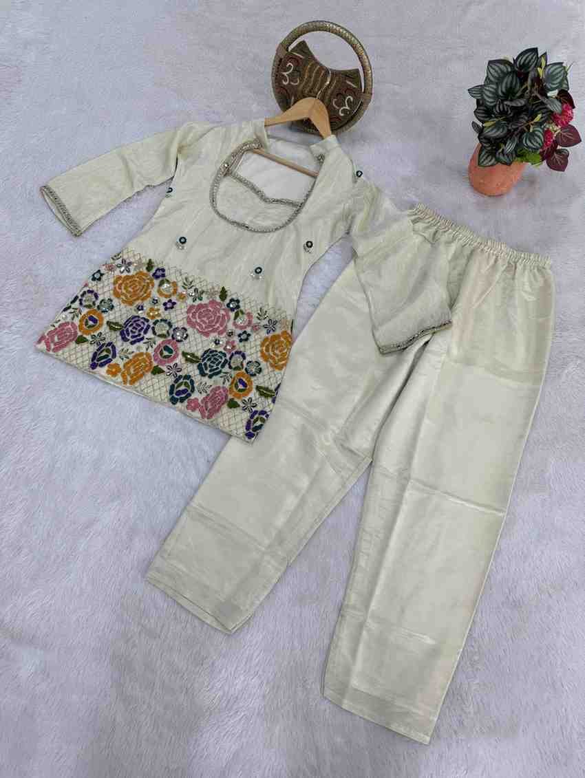 Ivory shimmer outfit with bustier top design