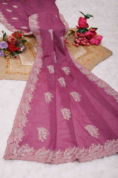 Elegant designer saree with mirror and stone embellishments